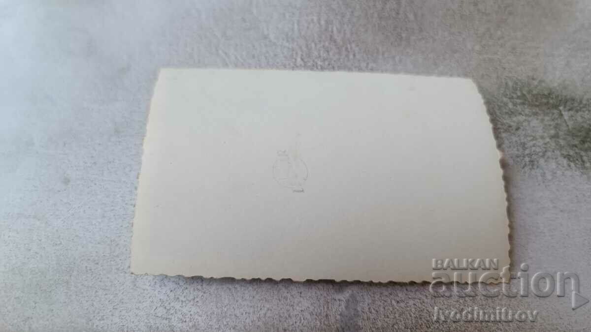 Photo Men pulling a large boat ashore with price 2.35 BGN | € 1.20 Photo Men pulling a large boat ashore with price 2.35 BGN | € 1.20