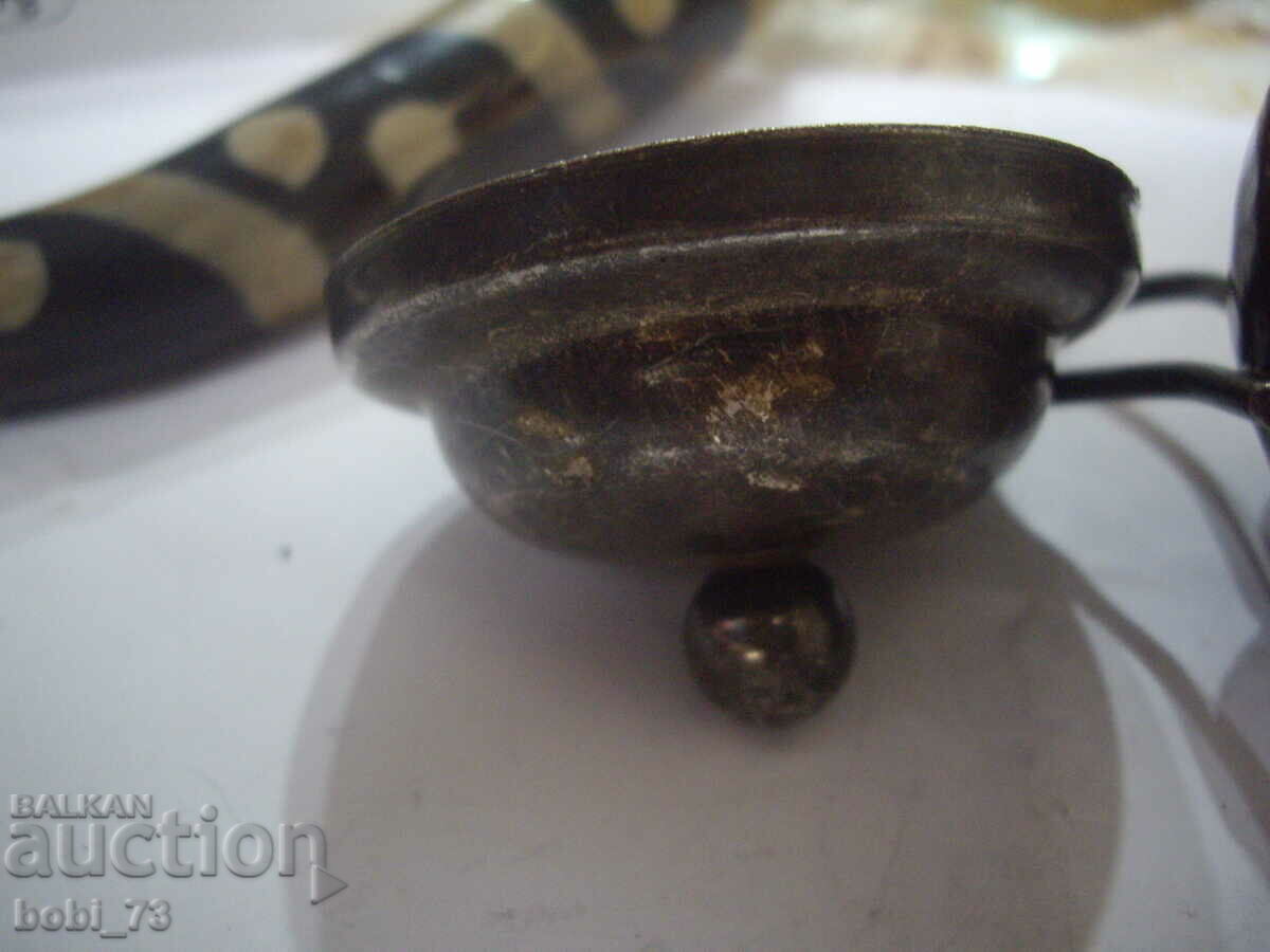 An old metal pot. - 5 An old metal pot. - 5