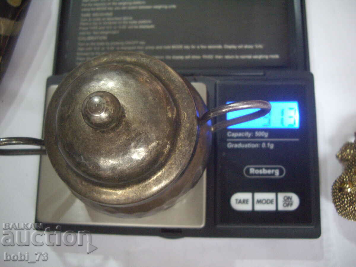 An old metal pot. - 6 An old metal pot. - 6