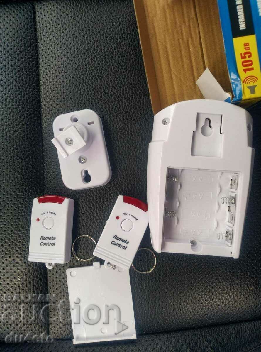 Auction  Alarm with motion sensor + 2 remotes, New!