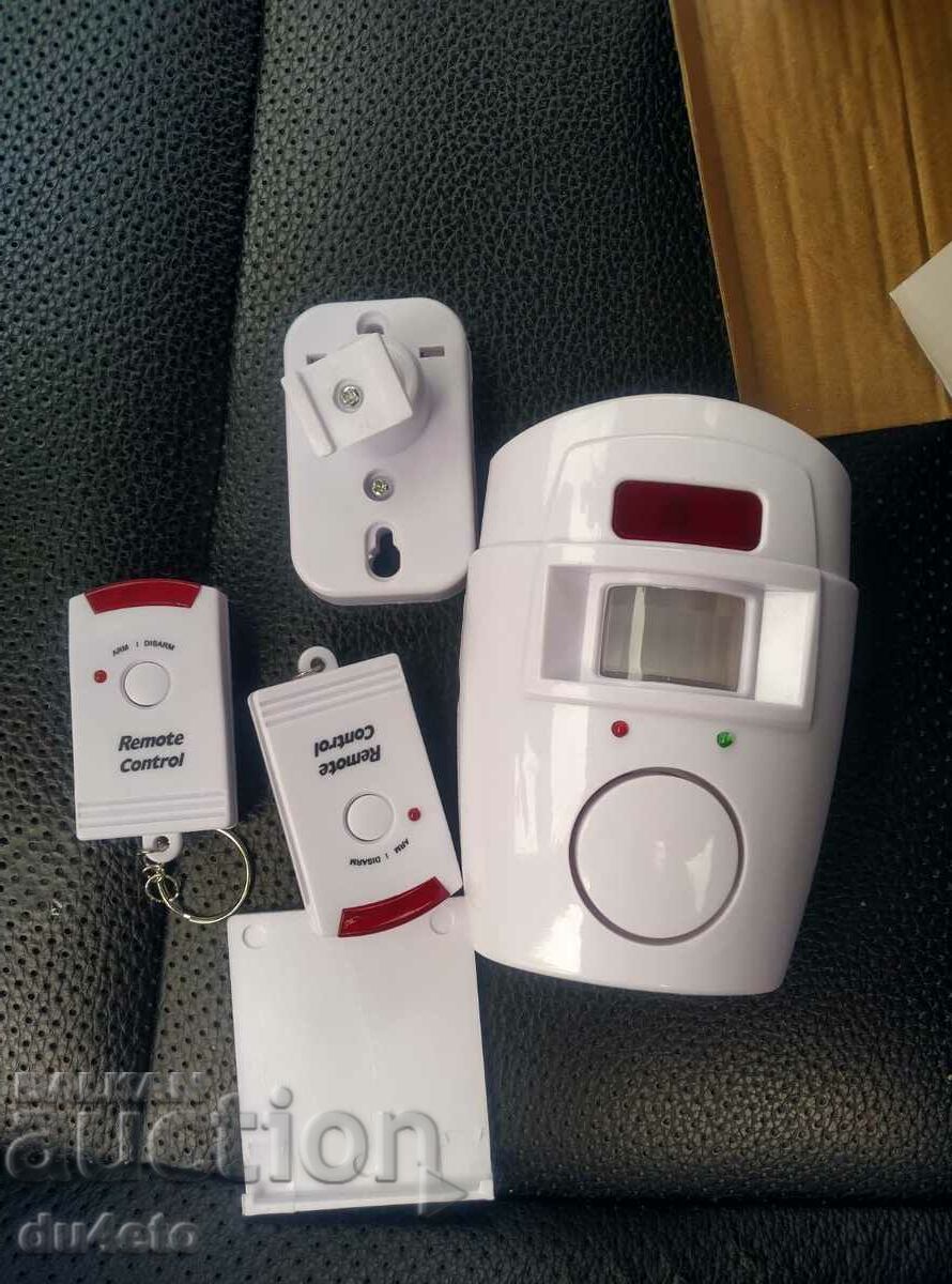 Alarm with motion sensor + 2 remotes, New!