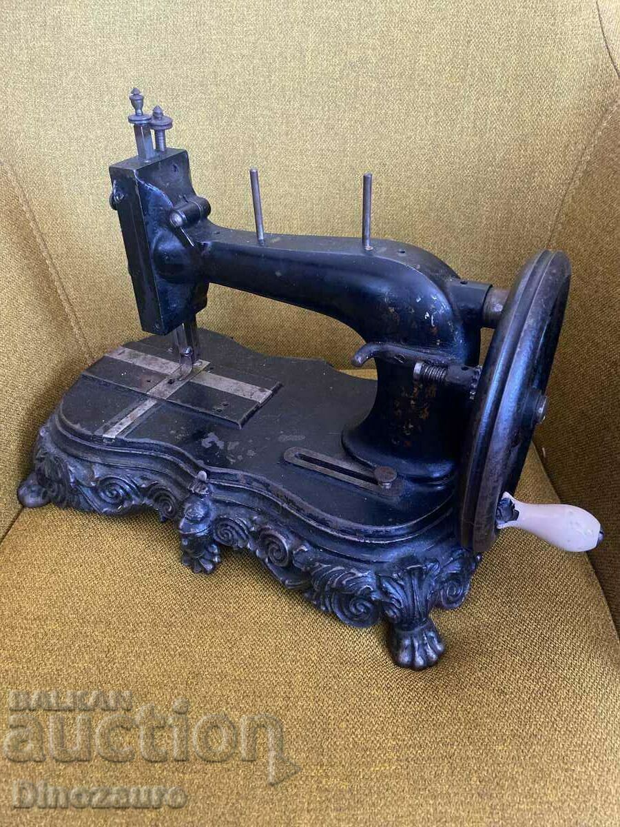 Sewing machine with metal base