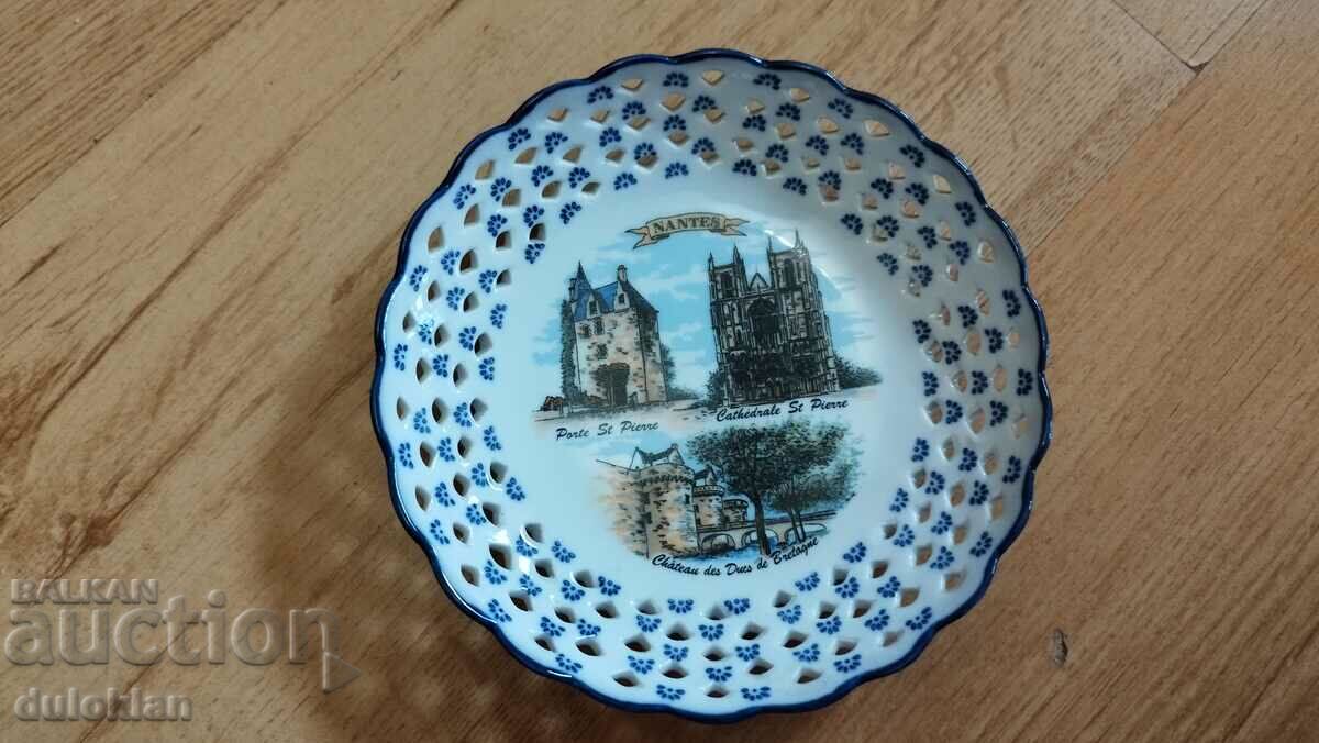 A beautiful porcelain plate from Nantes, France.