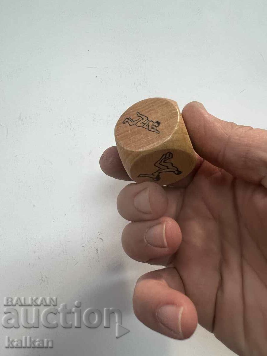 Wooden dice with sexual poses