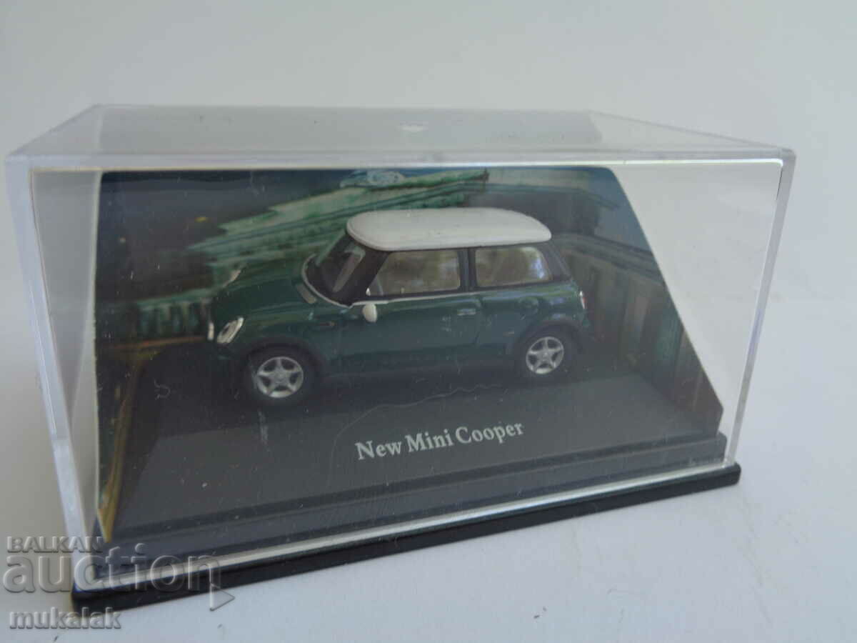 Delivery of 1:72 TCM/SCHUCO MINI COOPER TOY CAR MODEL Delivery of 1:72 TCM/SCHUCO MINI COOPER TOY CAR MODEL