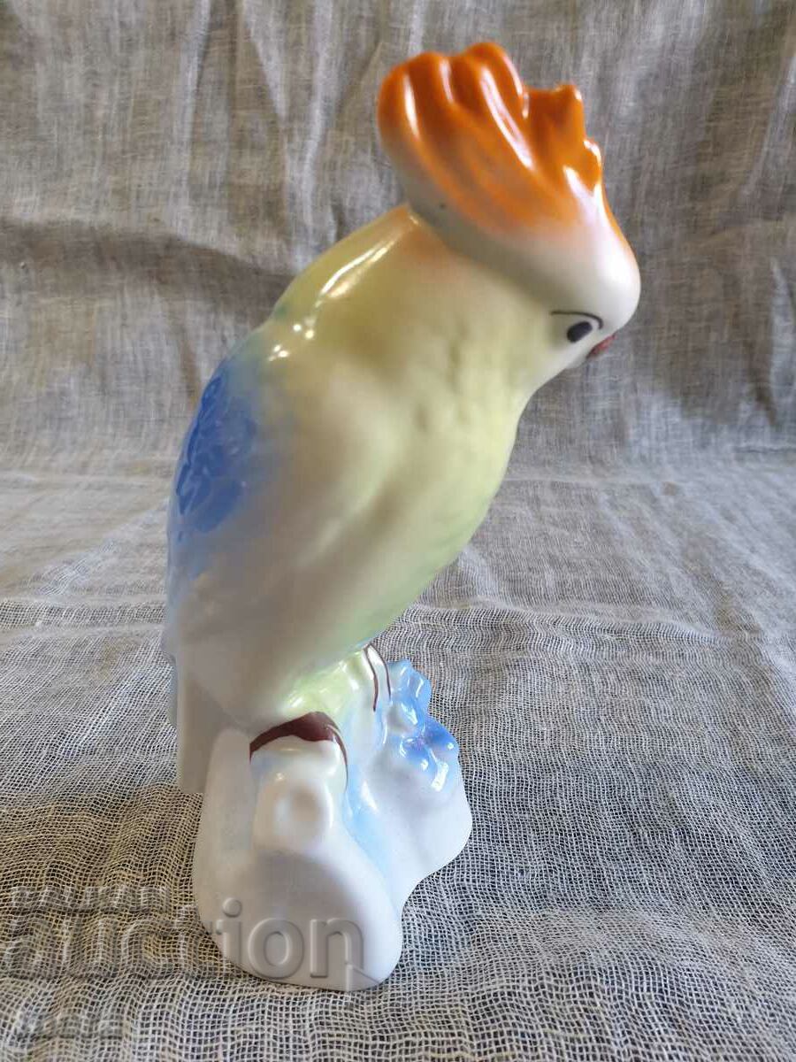 Auction  Porcelain fine fine Romanian figure of a parrot