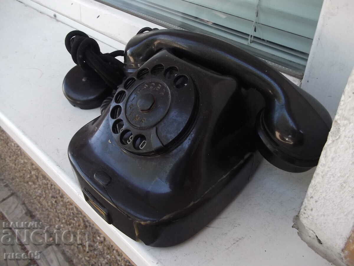 Delivery of Telephone puck black bakelite old from the early social - 1 Delivery of Telephone puck black bakelite old from the early social - 1