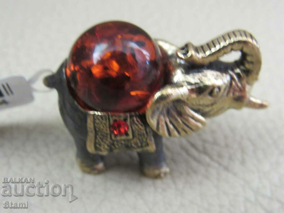 Auction Elephant figure-bronze and premium Baltic amber-cognac Auction Elephant figure-bronze and premium Baltic amber-cognac