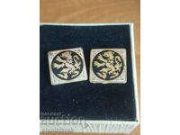 Enamel lion buttons with gilding