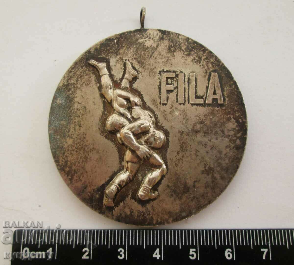Παλιό αθλητικό μετάλλιο πάλης FILA τουρνουά Nikola Petrov 1973. με τιμή 75.00 BGN | € 38.35 Παλιό αθλητικό μετάλλιο πάλης FILA τουρνουά Nikola Petrov 1973. με τιμή 75.00 BGN | € 38.35