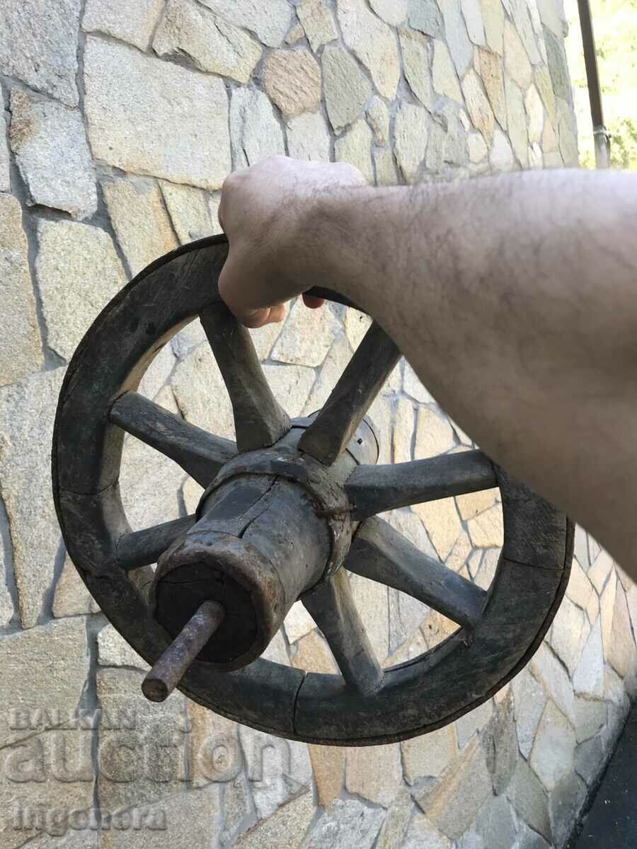 WHEEL OF AN OLD WOOD AND WROUGHT IRON WHEEL - 5 WHEEL OF AN OLD WOOD AND WROUGHT IRON WHEEL - 5