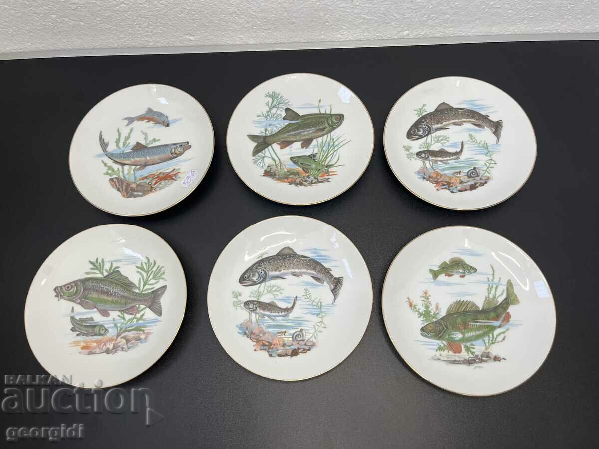 Japanese porcelain plates with fish decoration. #5644