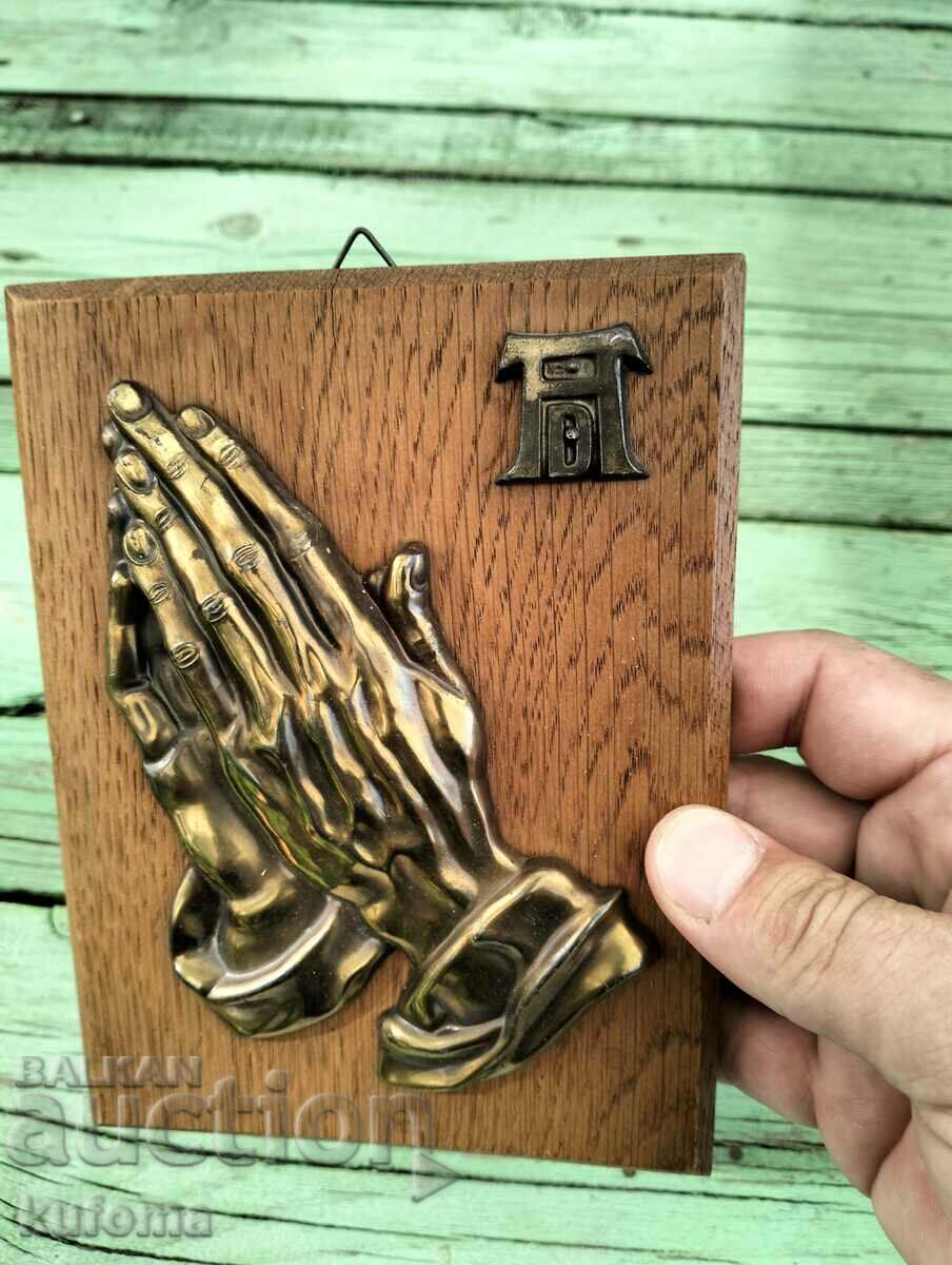 Delivery of The begging hands panel in wood and brass Delivery of The begging hands panel in wood and brass