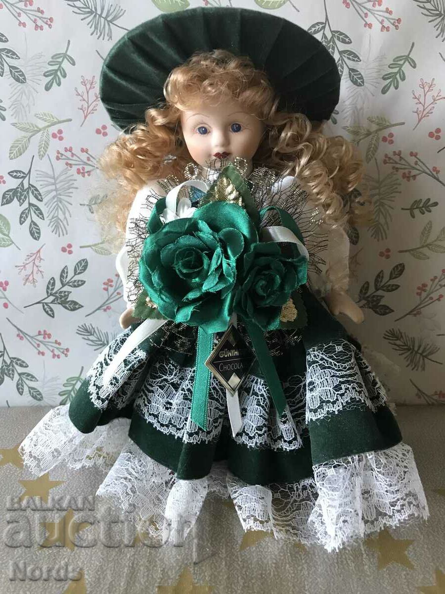 A beautiful doll with a porcelain face