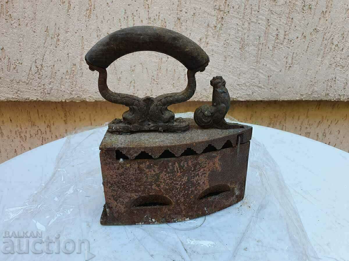 Auction  A hundred-year-old iron on fire. Perfectly preserved.