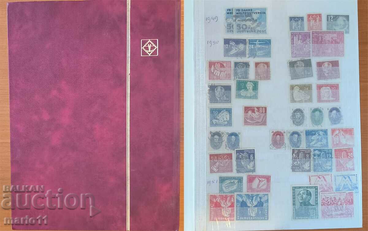 Old folder with stamps - GDR