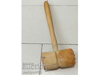 Old wooden mallet for STEAKS wooden tool