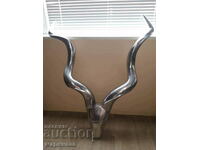 GREAT DESIGN. SCULPTURE OF AN ANTELOPE'S HEAD