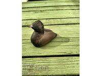 Λίγο ξύλο και χάλκινη πάπια