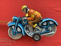 Old tin toy biker