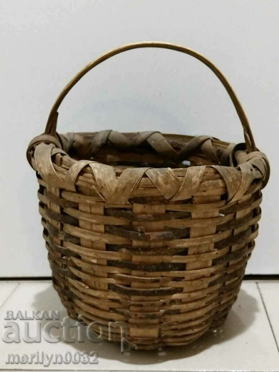 An old small basket made of wicker kosh paneer