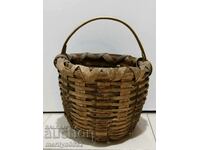 An old small basket made of wicker kosh paneer