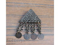 old Bulgarian ethnographic folk jewelry is a costume pendant