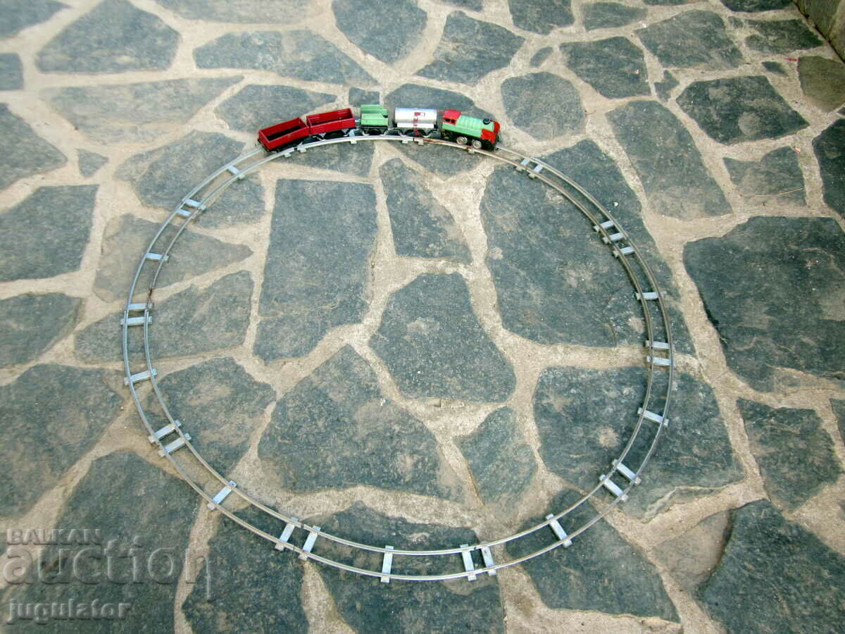 old metal mechanical toy locomotive with wagons and rails with price 160.00 BGN | € 81.81 old metal mechanical toy locomotive with wagons and rails with price 160.00 BGN | € 81.81