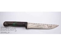 Hunting knife with engraved blade with hunting scene