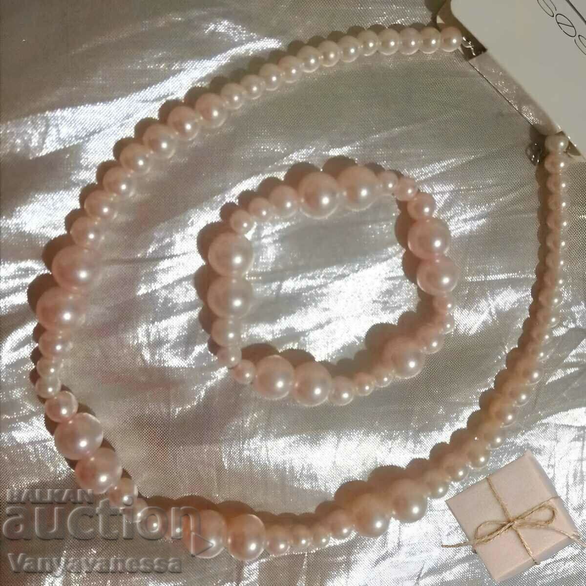 Set of pink pearl jewelry necklace and bracelet