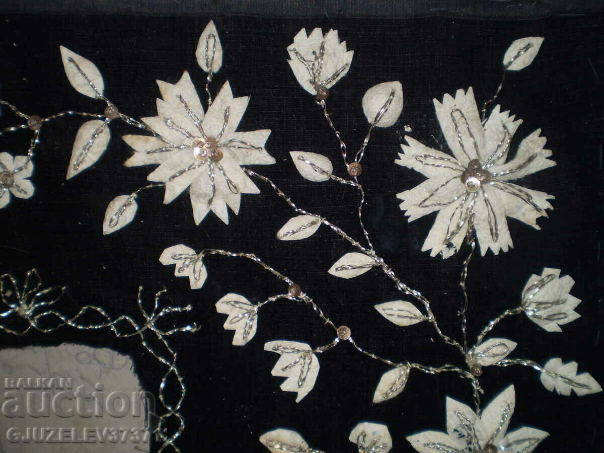 Delivery of 19th century hand embroidered picture frame on black