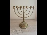 A massive Jewish bronze menorah candle holder