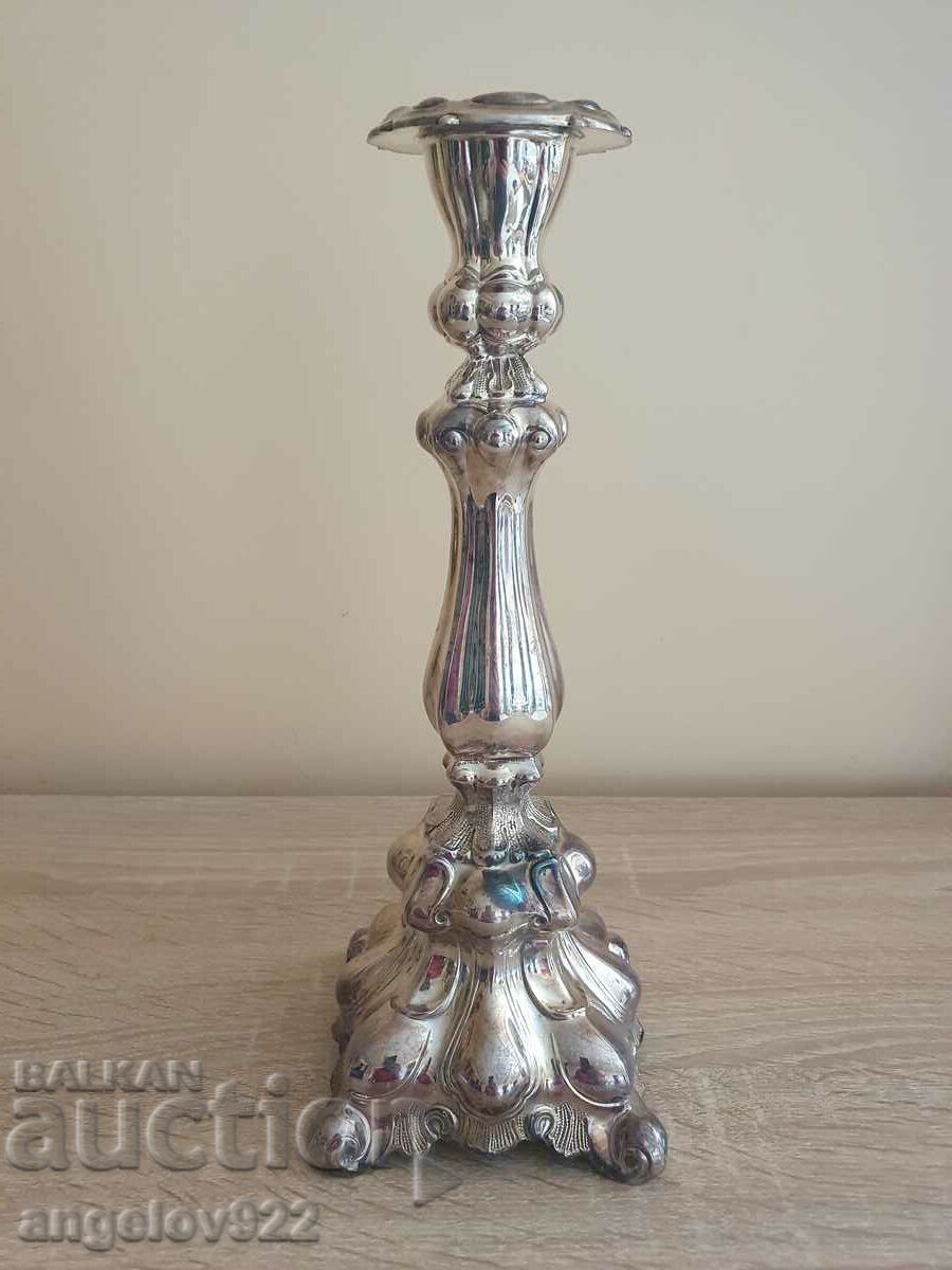 A beautiful PRIMA metal candle holder