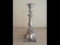 A beautiful PRIMA metal candle holder
