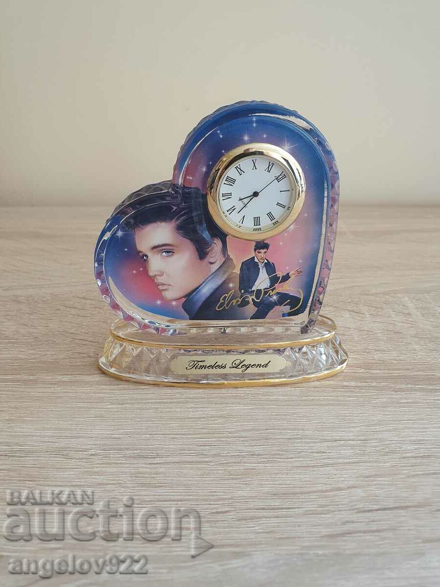 Glass figure paperweight with the face of Elvis Presley