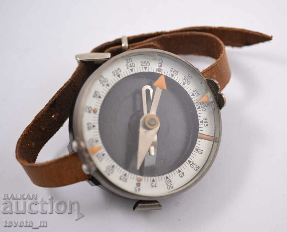 Military compass with bakelite case, leather strap