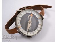 Military compass with bakelite case, leather strap