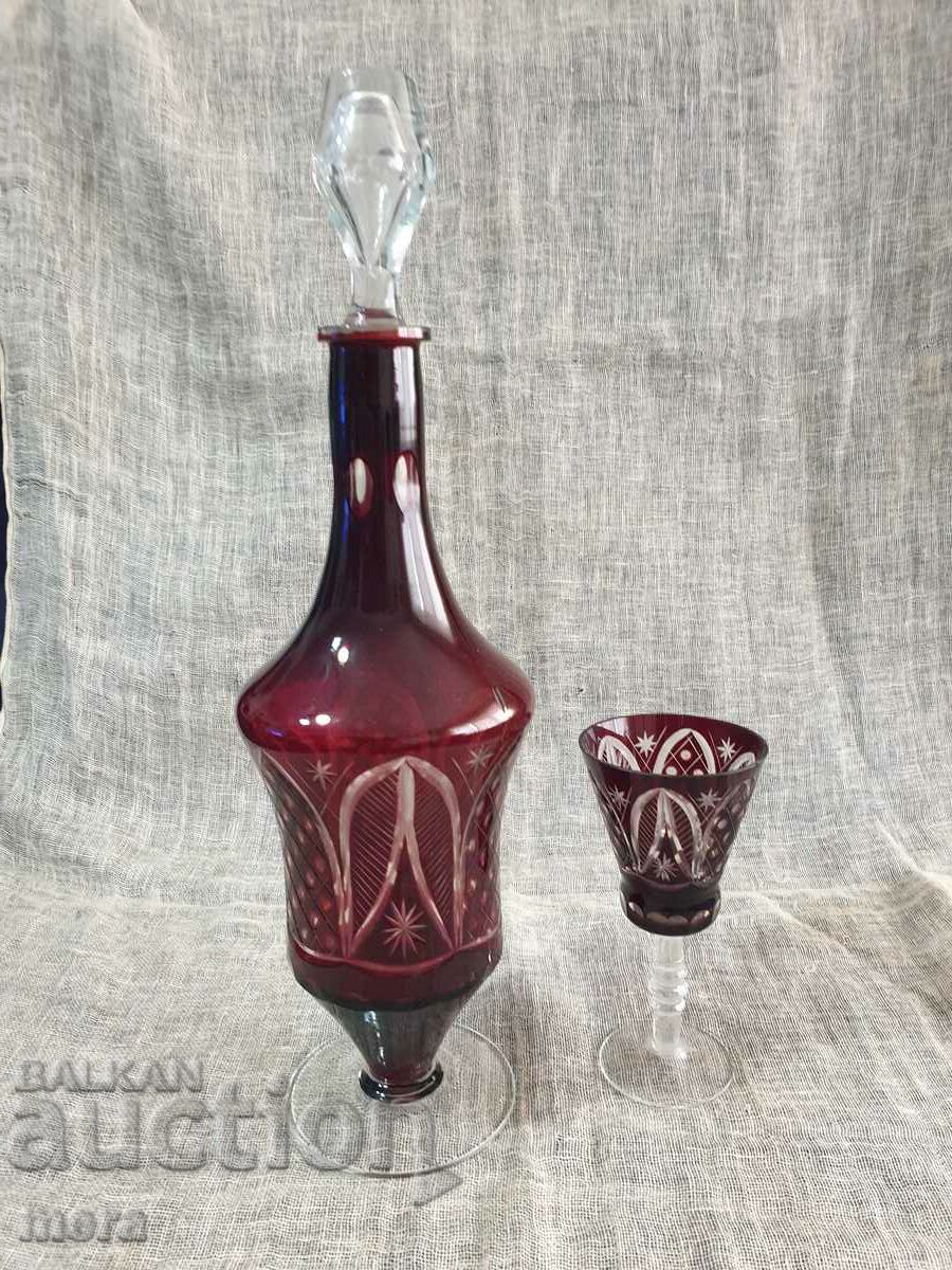 Carafe and glass of colored red crystal