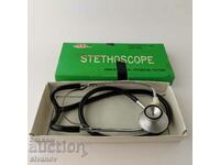 Παλιό ακουστικό γιατρού στηθοσκοπίου στο κουτί #5610