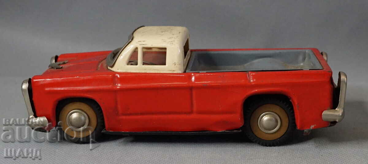 Παλιό μοντέλο φορτηγού μεταφοράς παιχνιδιών από μεταλλικό κασσίτερο