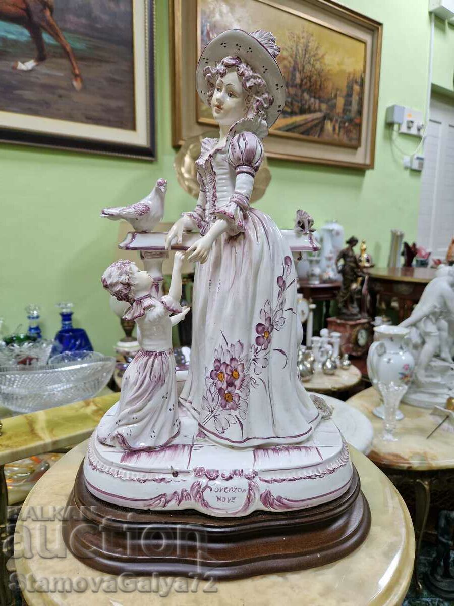 Large antique Lorenzon porcelain figure