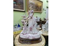 Large antique Lorenzon porcelain figure