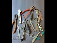 Lot of old pliers, screwdrivers, openers, etc.