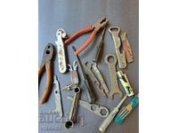 Lot of old pliers, screwdrivers, openers, etc.