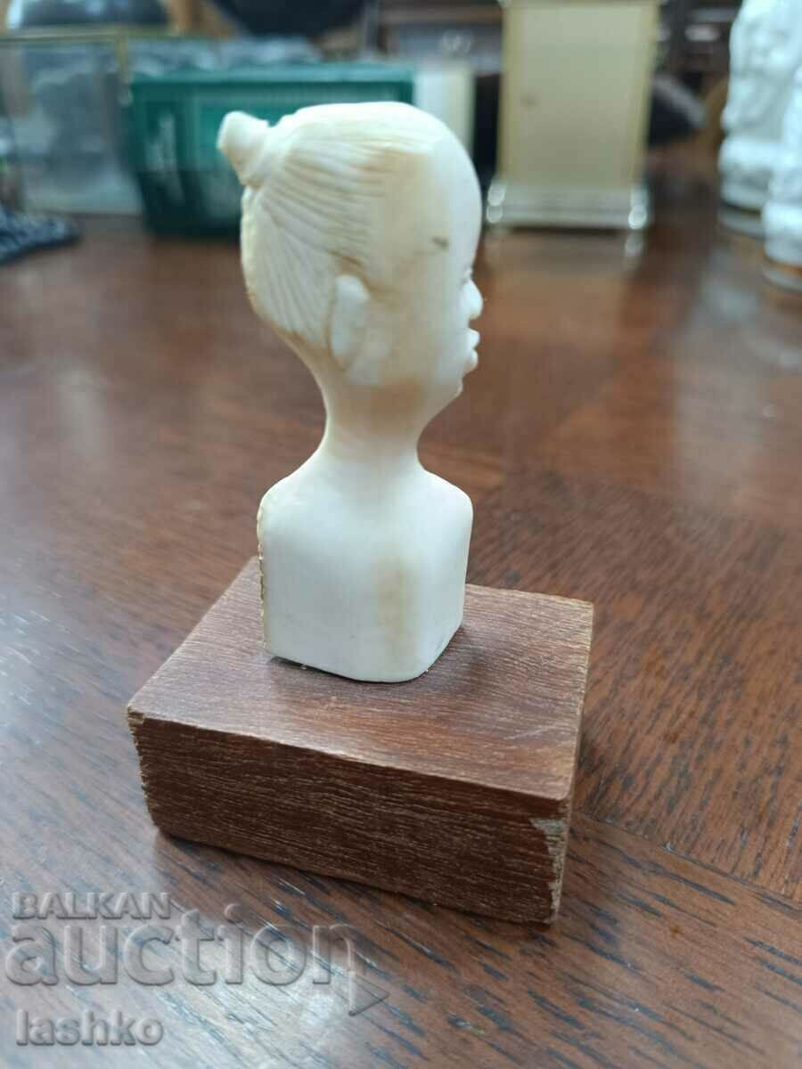 Auction Ivory figure Auction Ivory figure