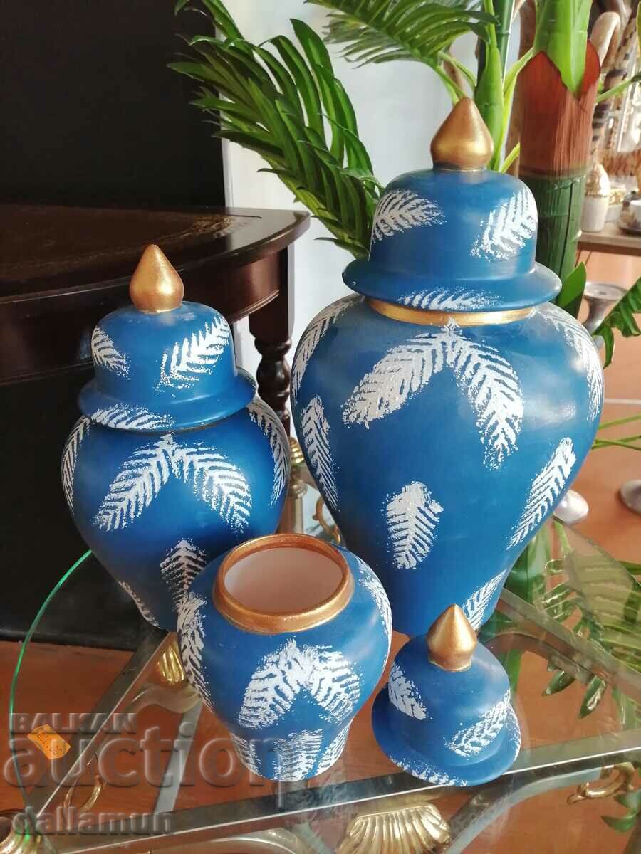 set of ceramic vases with lids