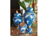 set of ceramic vases with lids