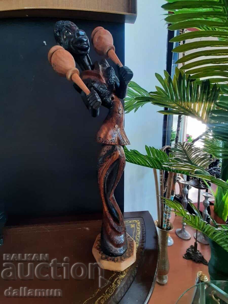 wooden figurine of an African musician with price 46.00 BGN | € 23.52 wooden figurine of an African musician with price 46.00 BGN | € 23.52