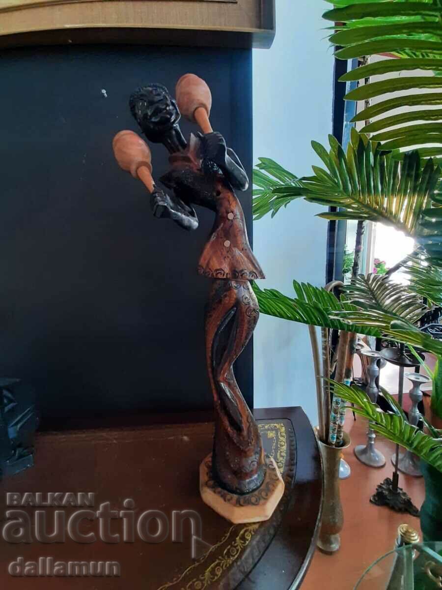 wooden figurine of an African musician