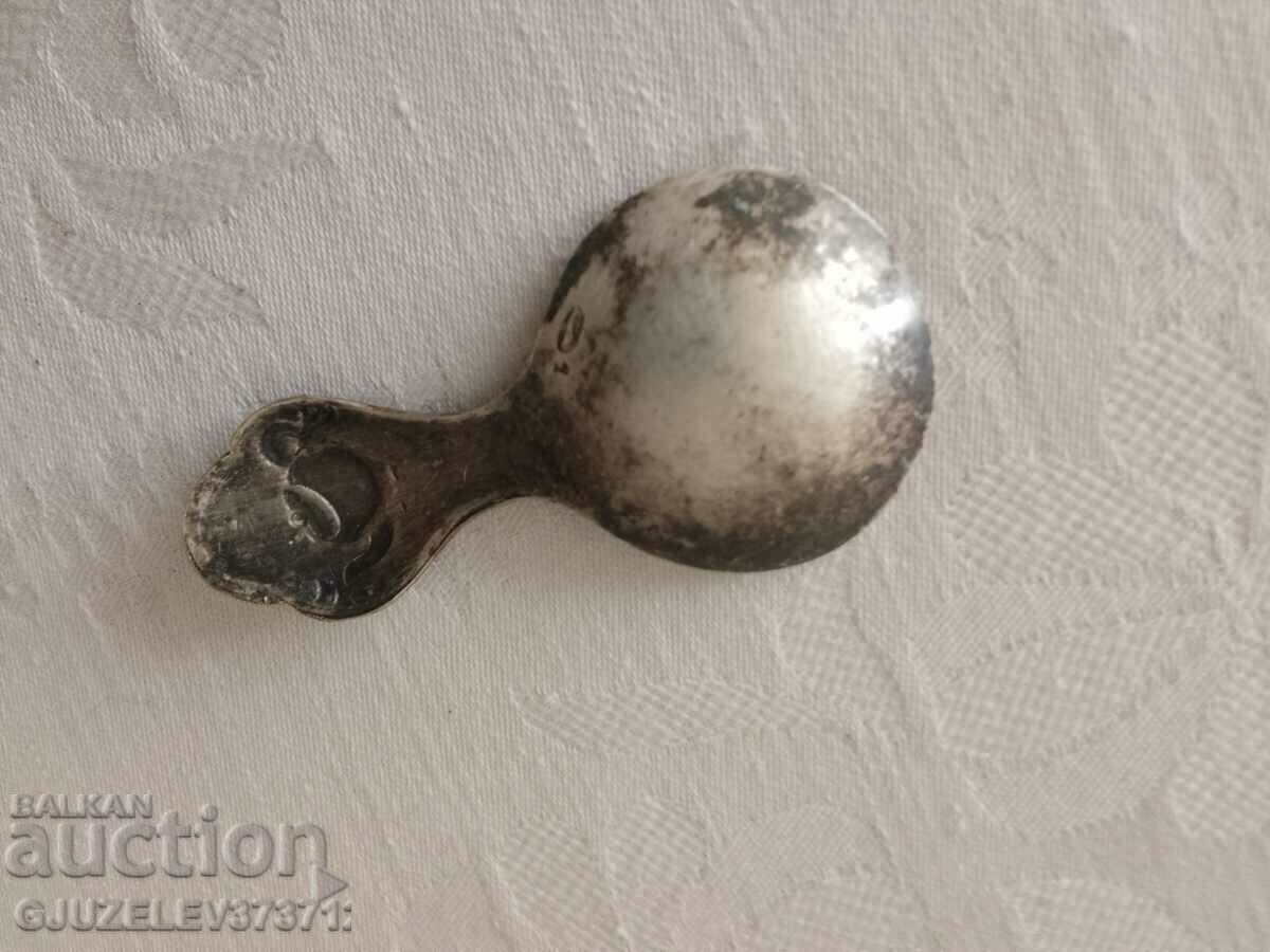 Delivery of Art deco spoon for feeding a child or for measuring tea Delivery of Art deco spoon for feeding a child or for measuring tea